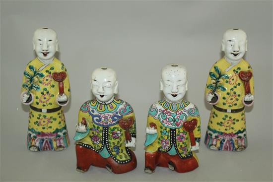 Four Chinese enamelled porcelain figures of the He He Erxian, late 18th / early 19th century, 17cm and 20.5cm